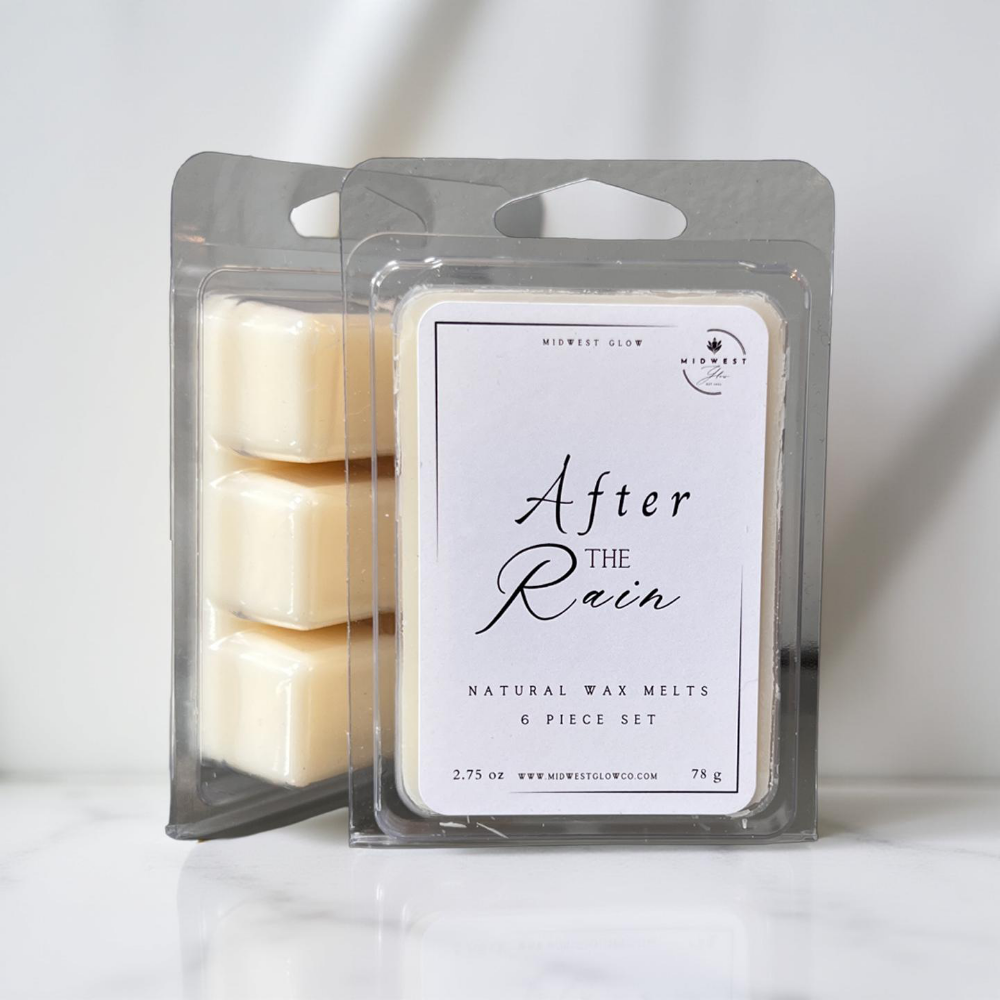 After the rain wax melts by Midwest glow sitting against a white backdrop showcasing the product