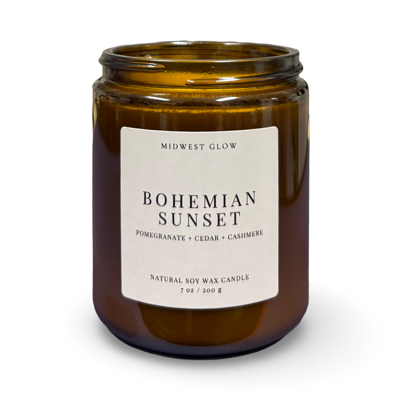 Brown candle jar with 'Bohemian Sunset' label on a white background