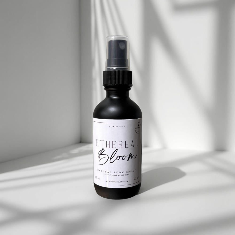 Ethereal Bloom Room Spray by Midwest Glow sits against a white backdrop with subtle shadows showcasing the product
