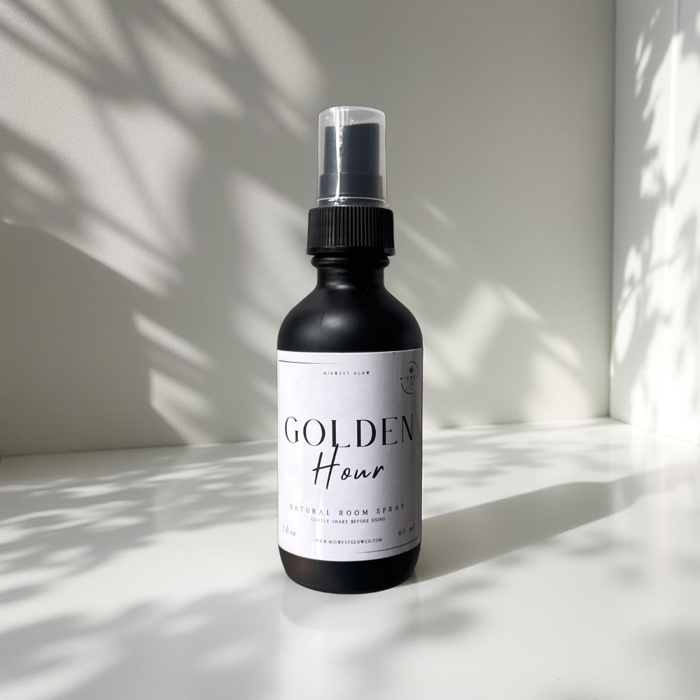 Golden Hour Room Spray by Midwest Glow sitting against a white backdrop with subtle shadows to showcase the product