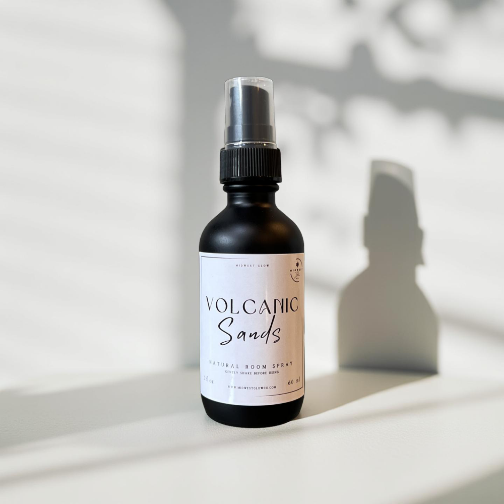 Volcanic Sands Room Spray sits against a white backdrop showcasing the product