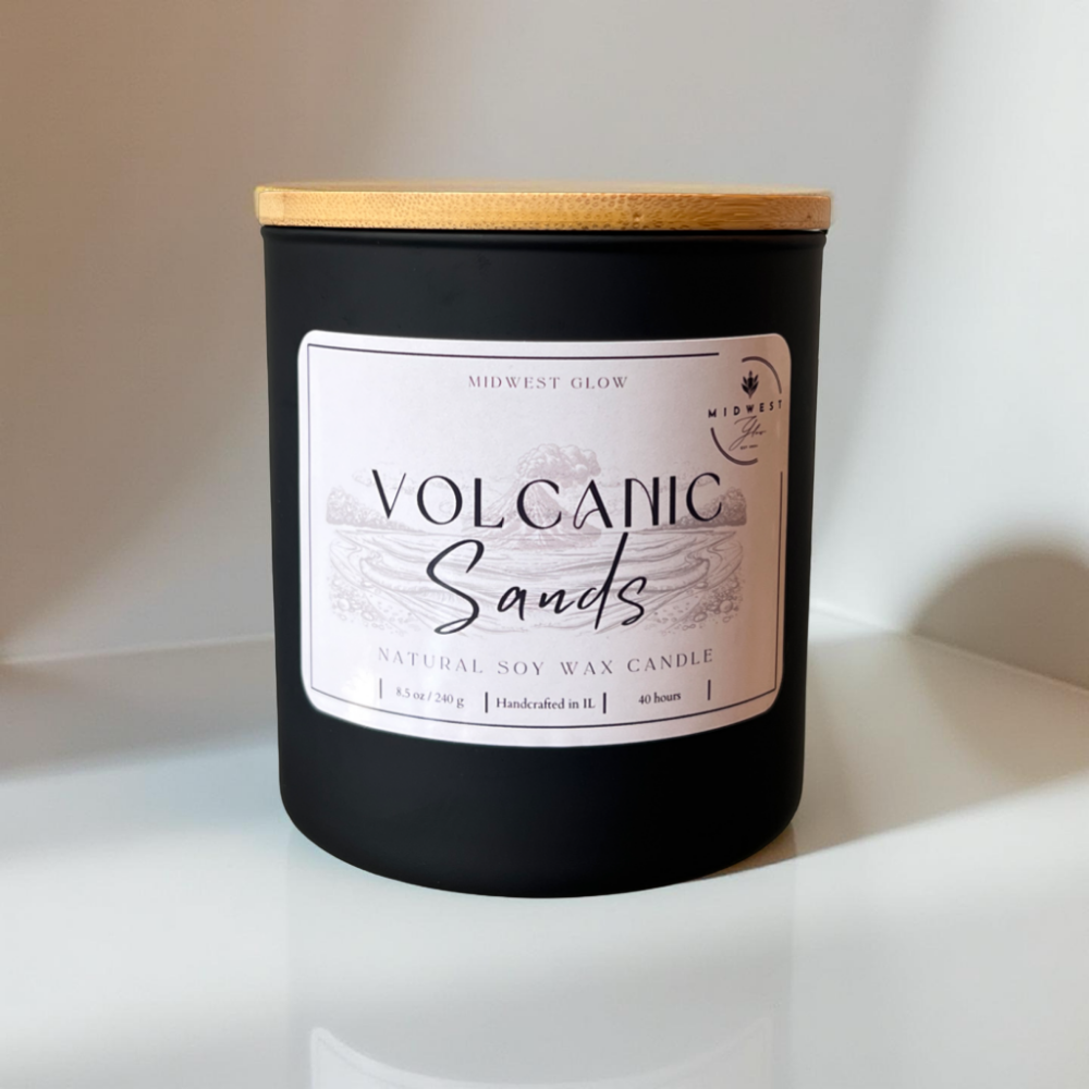 Volcanic Sands soy candle by Midwest glow against a minimalist white background showcasing the product