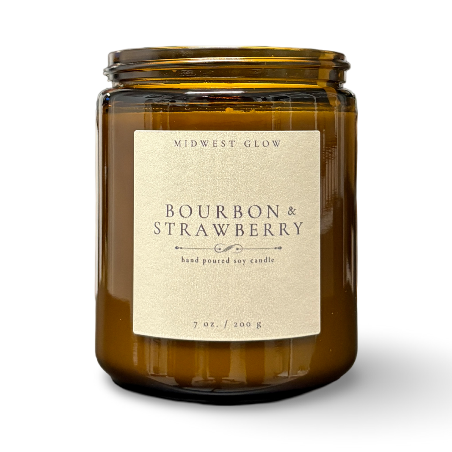 Brown candle jar with 'Bourbon & Strawberry' label on a white background