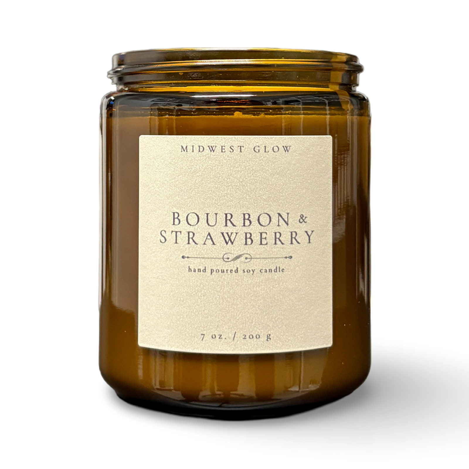 Brown candle jar with 'Bourbon & Strawberry' label on a white background