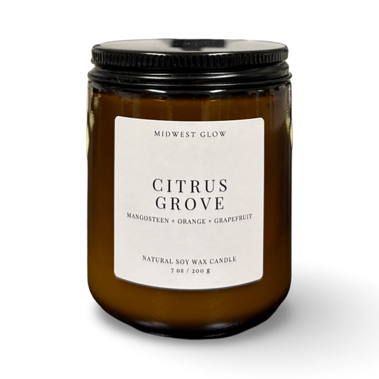 Candle jar labeled 'Citrus Grove' by Midwest Glow on a white background