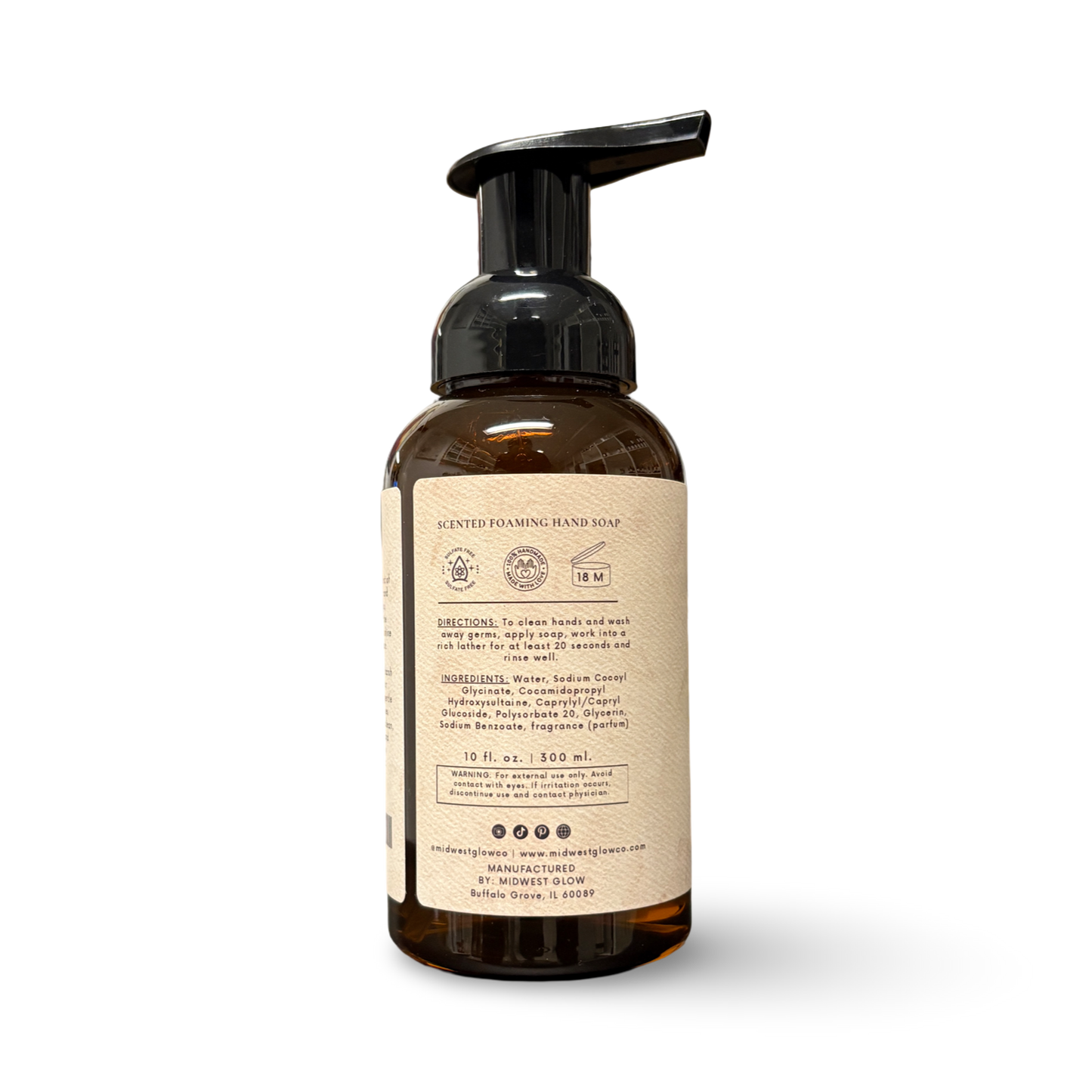 Foaming hand soap bottle with a label on a white background