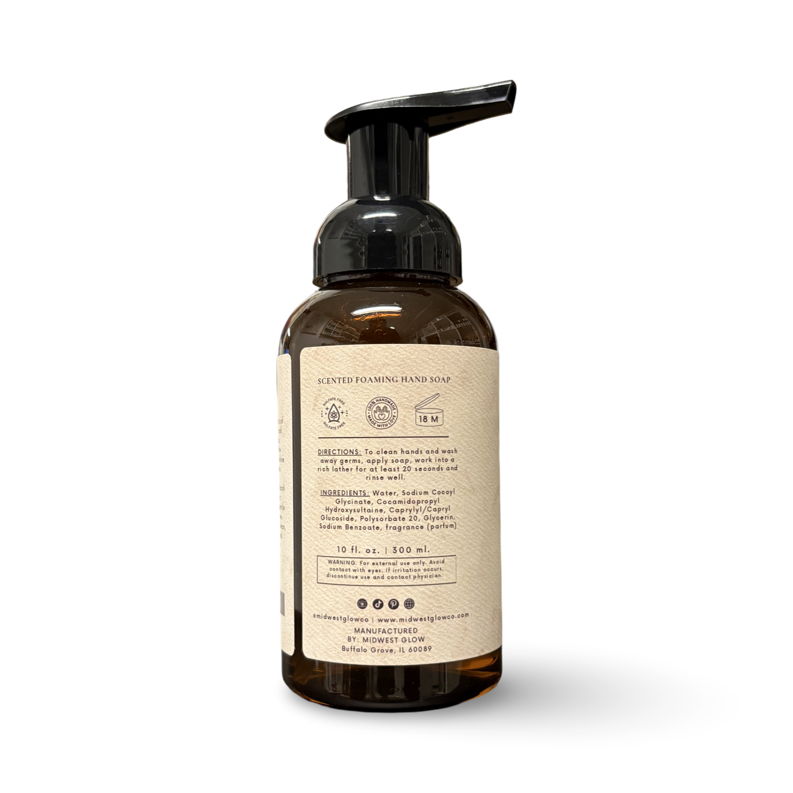Foaming hand soap bottle with a label on a white background