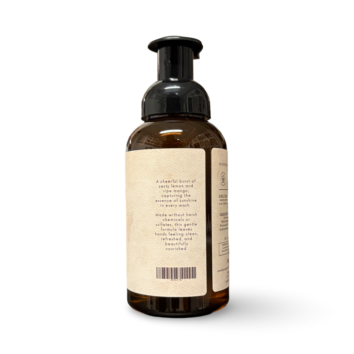 Brown bottle with pump and white label on a white background