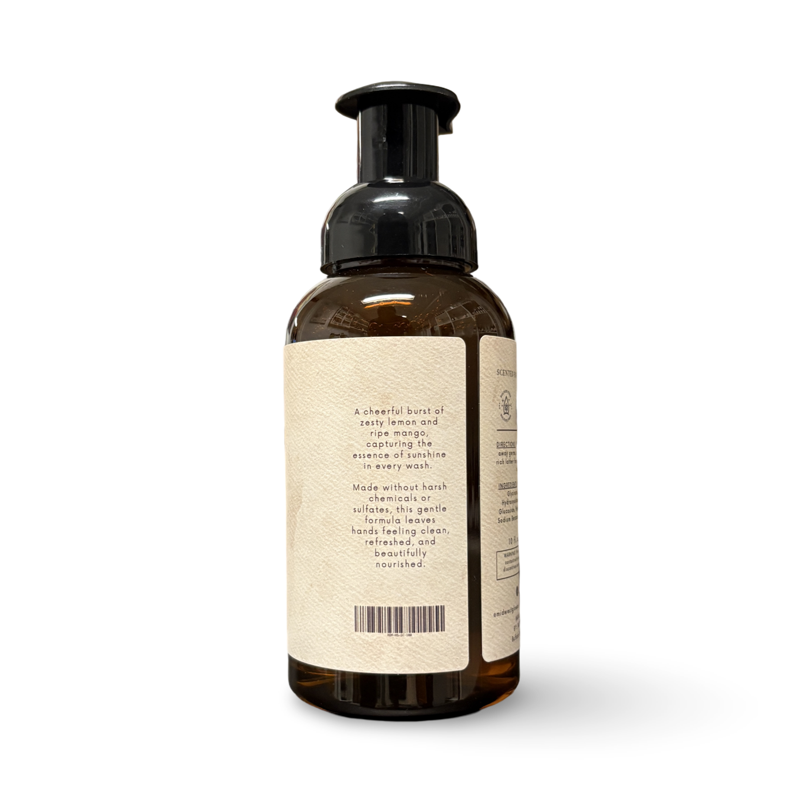 Brown bottle with pump and white label on a white background