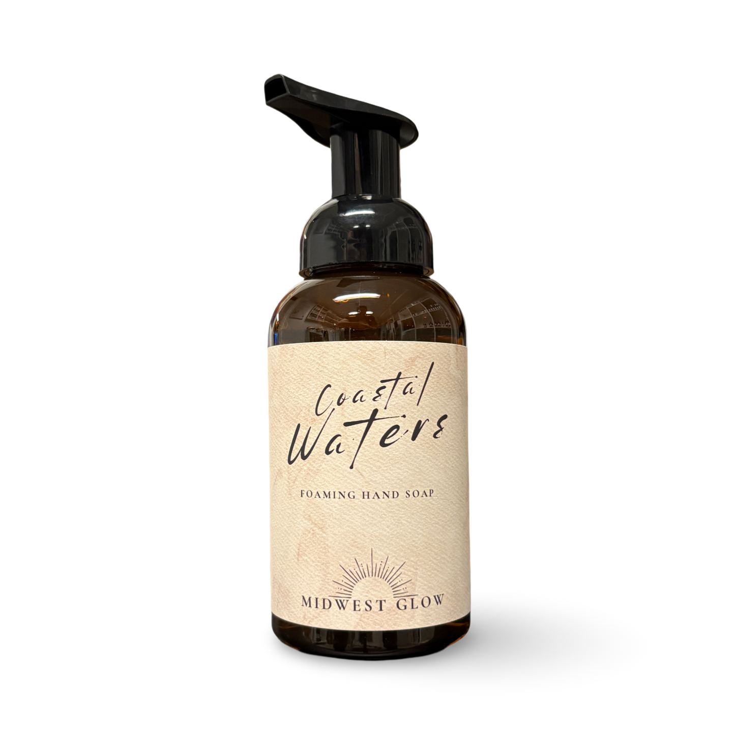 Foaming hand soap bottle labeled 'Coastal Waters' by 'Midwest Glow' on a white background
