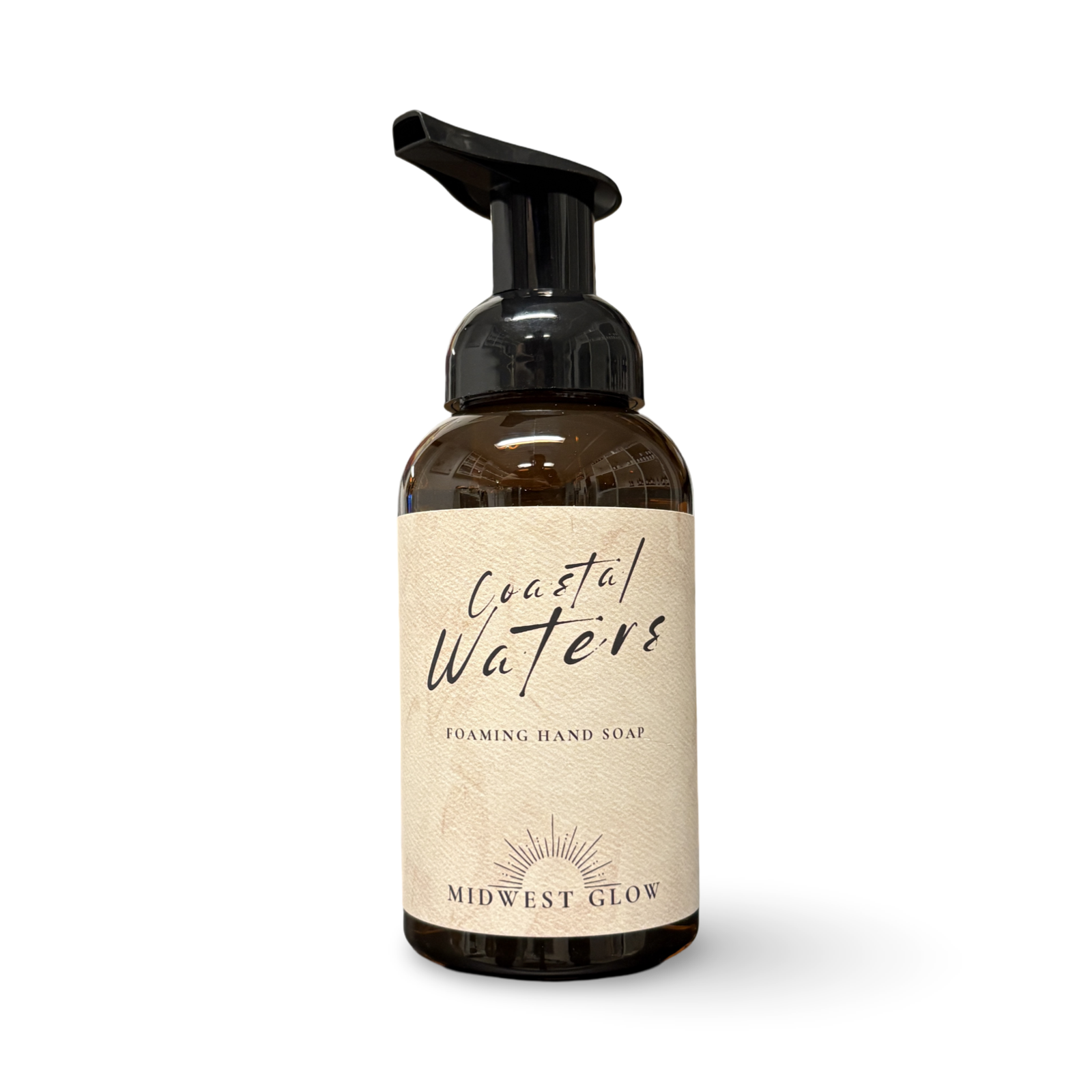 Foaming hand soap bottle labeled 'Coastal Waters' by 'Midwest Glow' on a white background