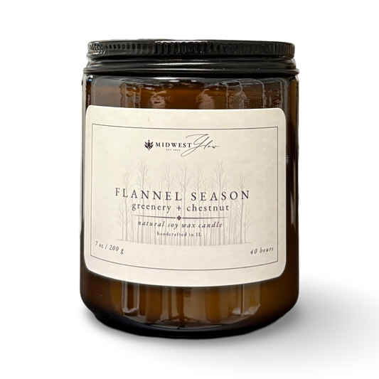 Candle with a label on a white background