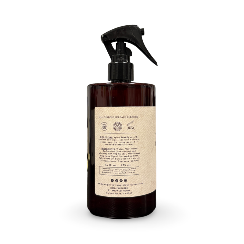 Brown spray bottle with a label on a white background