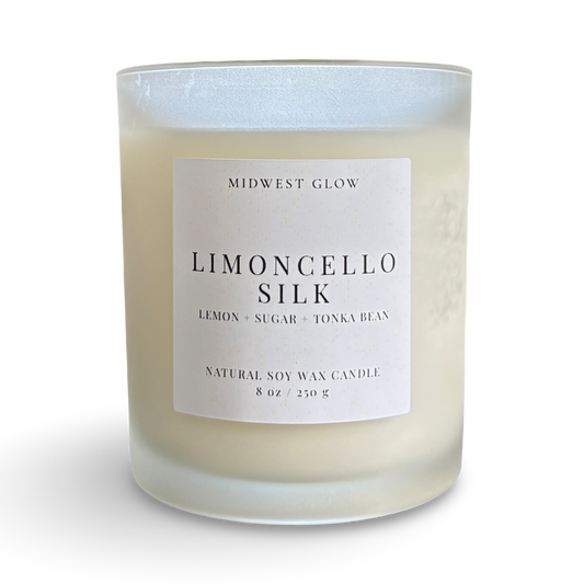Candle with 'Limoncello Silk' label on a white background