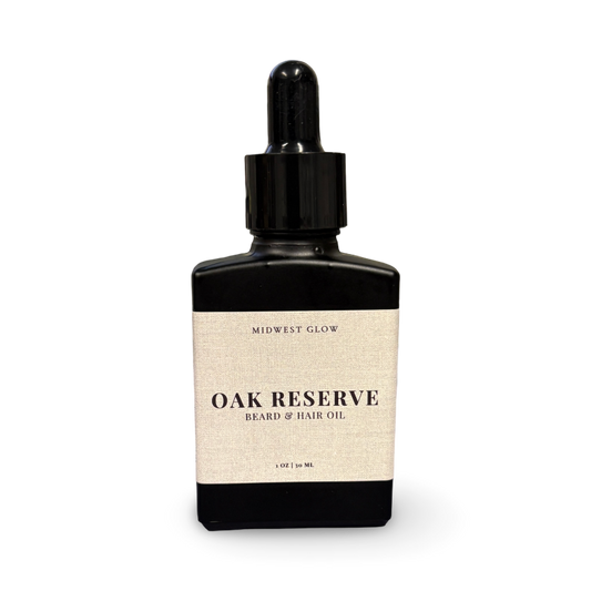 Bottle of Oak Reserve beard and hair oil with a dropper on a white background