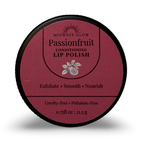 A round black plastic tub of Midwest Glow Passionfruit Conditioning Lip Polish, featuring a dusty rose pink label with black and white text and a passionfruit illustration.