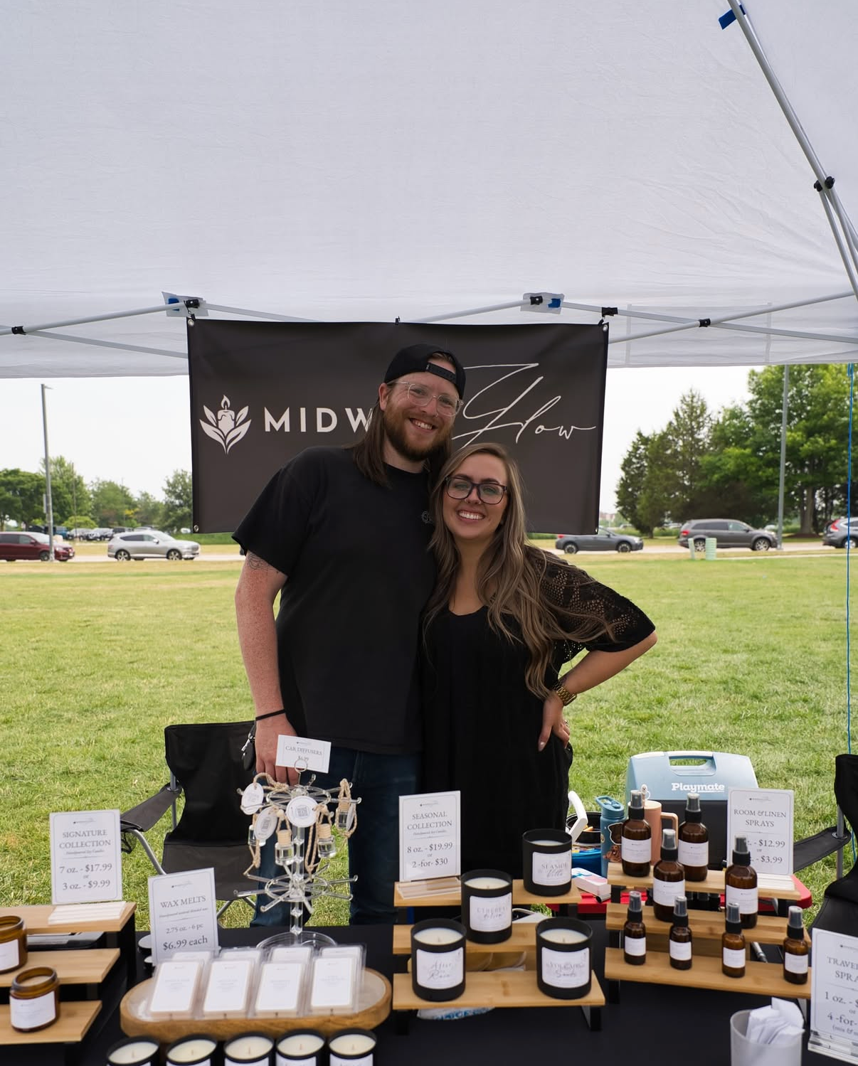 A photo of JD and Ash from Midwest Glow at an event