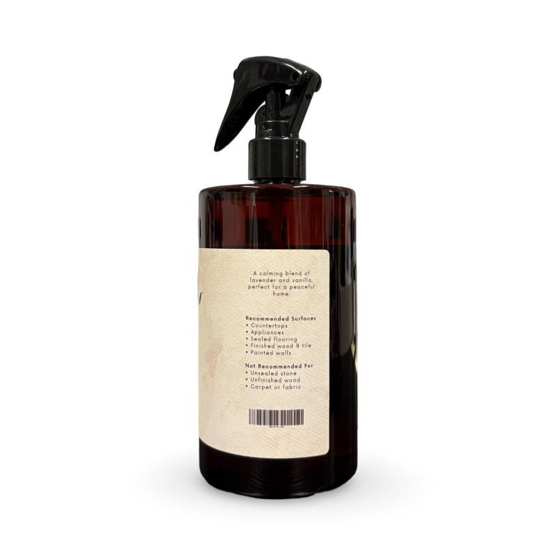 Brown spray bottle with a label on a white background