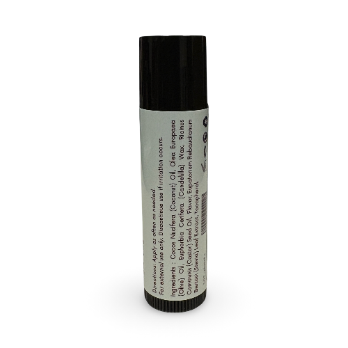 A single black cylindrical bottle of essential oil or fragrance oil with a white label, shown upright on a plain white background.