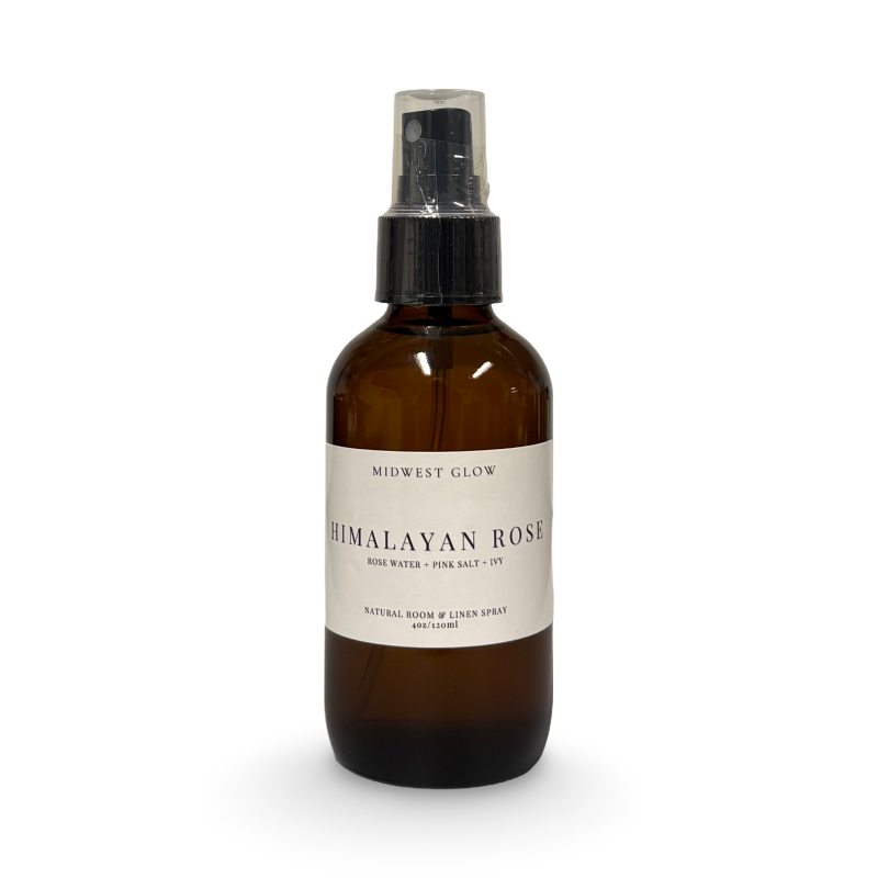 Brown spray bottle labeled 'Himalayan Rose' on a white background