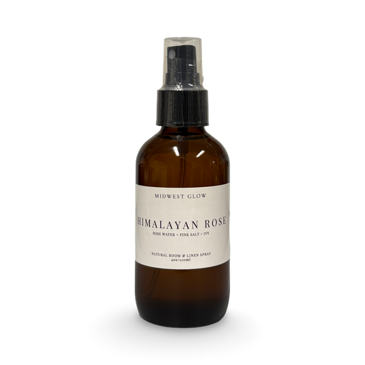 Brown spray bottle labeled 'Himalayan Rose' on a white background